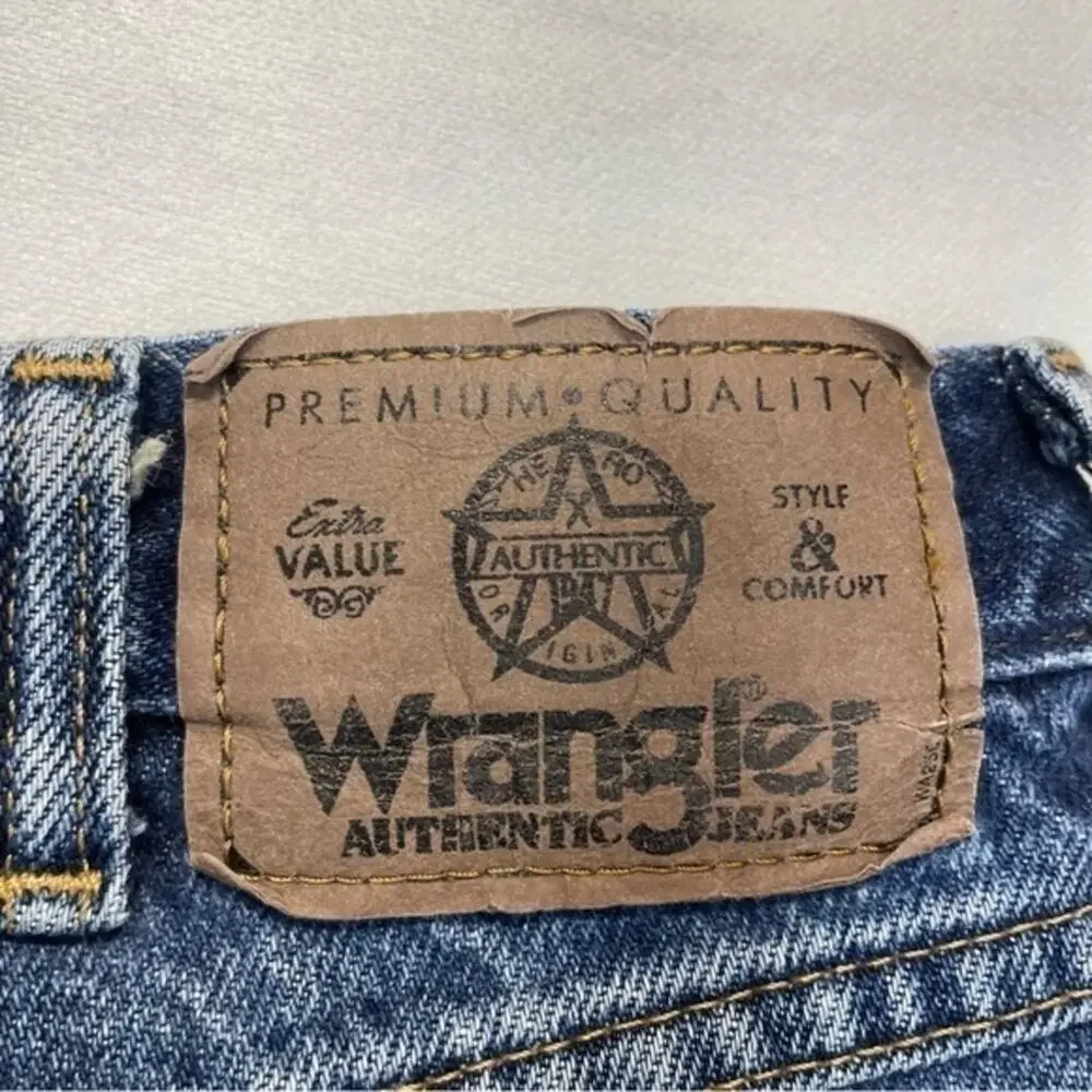 Wrangler Jeans Size 38 medium wash blue distressed denim workwear 90s vintage